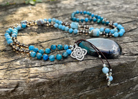 Mala długa z Larimaru, Apatytu i Kwarcu Dymnego